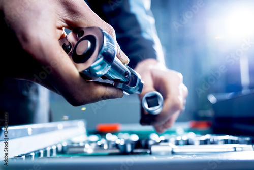 Tools at the hands. Auto repair © romaset