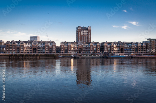 Poster Plantation Wharf, Chelsea riverfront on river Thames, London UK.