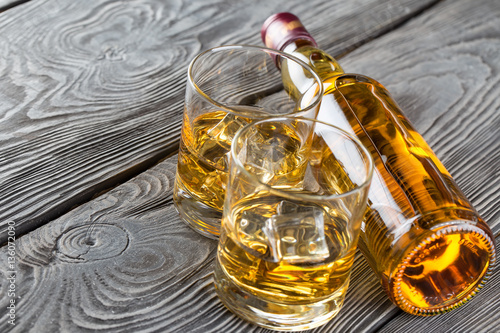 Bottle and glass of whiskey