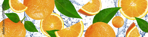  Oranges with green leaves in the water