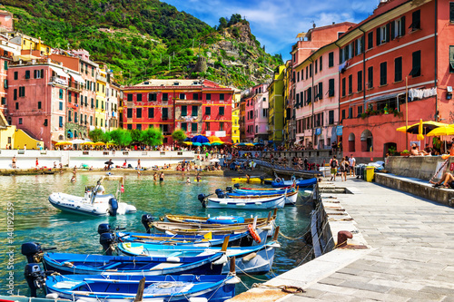 Poster View of the boats and old Vernazza village, Cinque Terre, Italy.