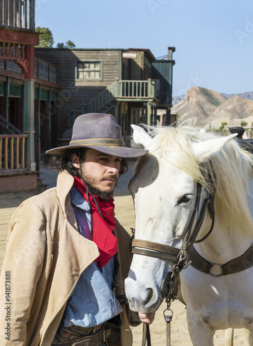 Poster Cowboy with his horse at the Western Town at Mini Hollywood, Tabernas, Almeria P