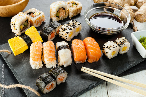 Slate tray of assorted sushi