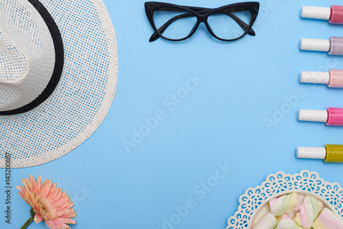 Stampa su Tela Flat lay of feminine collection of hat, glasses and nail polishes