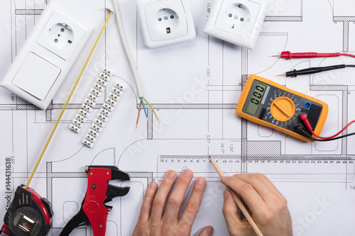 Poster Architect Drawing Plan On Blueprint With Electrical Components