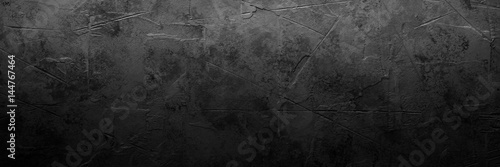 Black empty concrete stone texture. Slate background. Long banner format.