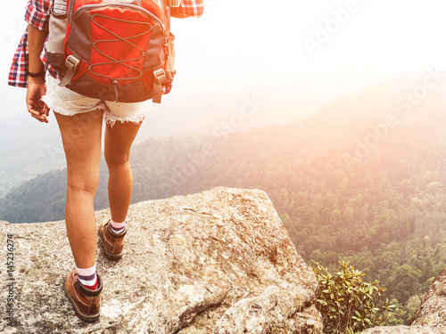 Girl hipster Freedom traveler on the mountian.