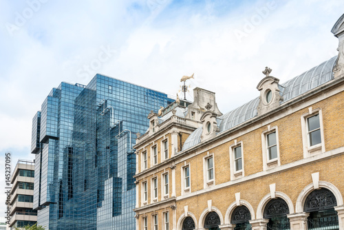 Poster Beautiful street view of business modern buildings in London, England, UK