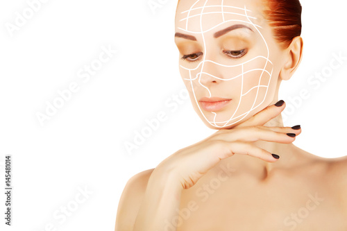 Poster young red haired woman closeup with surgery lines, white background