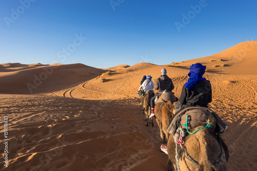 Camel tour at sunset to Erg Chebbi in Sahara desert, Merzouga, Morocco © Francesco Bonino