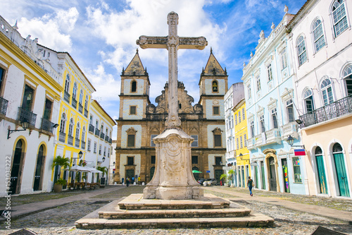 Obraz na płótnie Bright view of Pelourinho in Salvador, Brazil, dominated by the large colonial Cruzeiro de Sao Francisco Christian stone cross in the Praça Anchieta