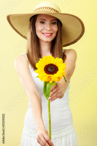 portrait attractive woman with sunflower