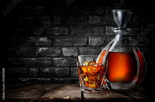 Whiskey and brick wall