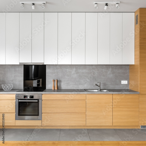Fototapeta Kitchen with grey tiling