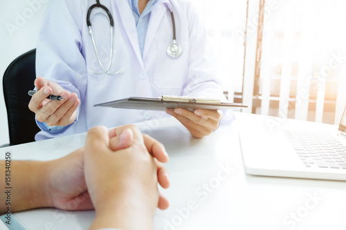 Doctor consult patient in office hospital.
