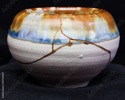 A handmade pot made that was broken and I repaired with the Japanese art form of kintsugi.
 © photoBeard