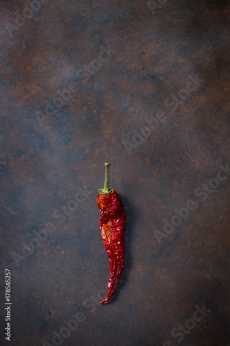 Dry pepper on rustic background