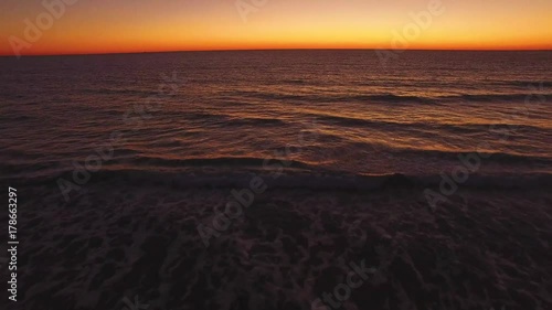 Aerial view of the sea at sunset
