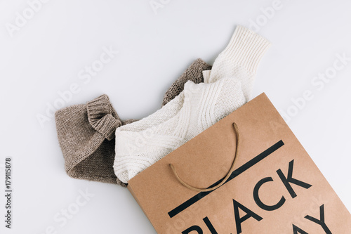 clothes in shopping bag