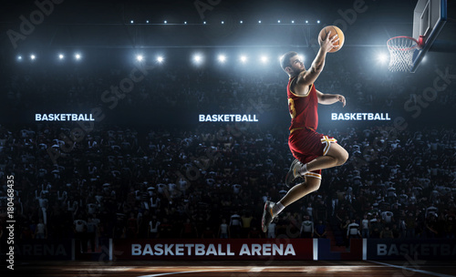 Obraz na płótnie one basketball player jump in stadium panorama view