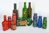 many different bottles, painted dot painted on isolated background. 