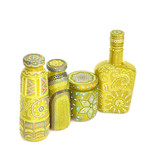 many different bottles, painted dot painted on isolated background. 