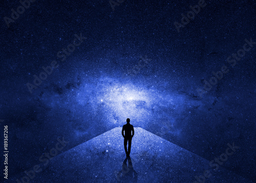 Man walking through the universe