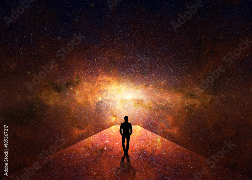 Man walking through the universe