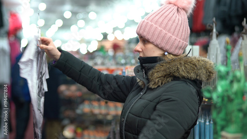 Attractive young woman shopping at gift shop