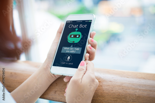 artificial intelligence,AI chat bot concept.close-up of Female hands holding mobile phone