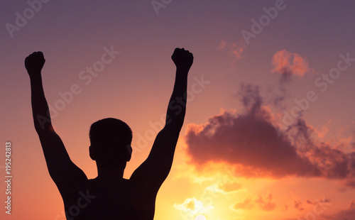 Winning and motivation. Young man feeling strong, victorious!