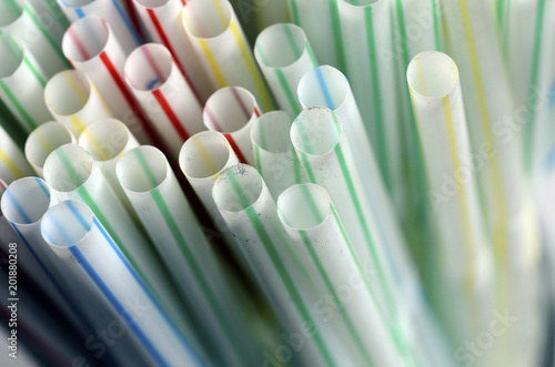 Dirty colored plastic straws © fullempty