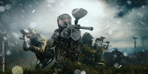Paintball team in uniform and masks, extreme sport © Nomad_Soul