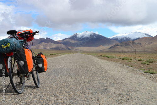 Long distance cycling on M41 Pamir Highway, Pamir Mountain Range, Tajikistan © Travel Nerd