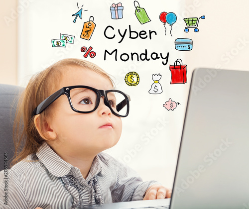 Cyber Monday text with toddler girl using her laptop