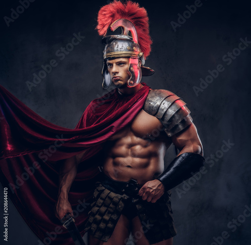 Portrait of a brutal Roman legionary in battle uniforms