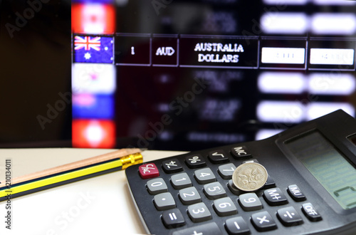 Five Cents Coin Of Australia On The Calculator With Pencils On The White Floor And Digital Five Cents Coin Of Australia On The Calculator With Pencils On The White Floor And Digital