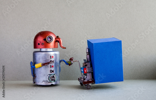 Robot courier moving big blue container with powered pallet jack. Forklift cart mechanism on gray background. Robotic logistic delivery service concept. Copy space