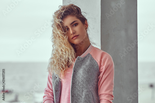 Close Up Portrait Of Sensual Young Girl With Curly Blonde Hair