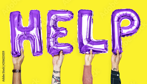 Purple alphabet balloons forming the word help