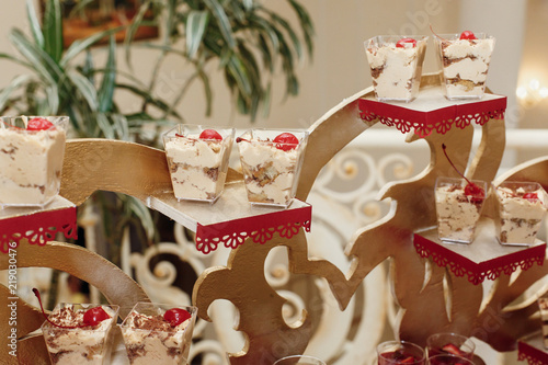 Stylish Desserts With Cherry Candy Bar Sweets At Luxury Stylish Desserts With Cherry Candy Bar Sweets At Luxury Wedding Reception Catering