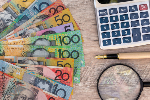 Australian Dollars With Calculator Pen And Magnifier Photos Australian Dollars With Calculator Pen And Magnifier