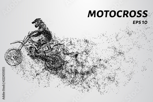 Motocross particles. A motorcyclist performs stunts © newrossosh