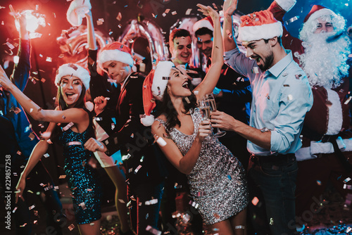 Happy Young People Dancing on New Year Party. © VadimGuzhva