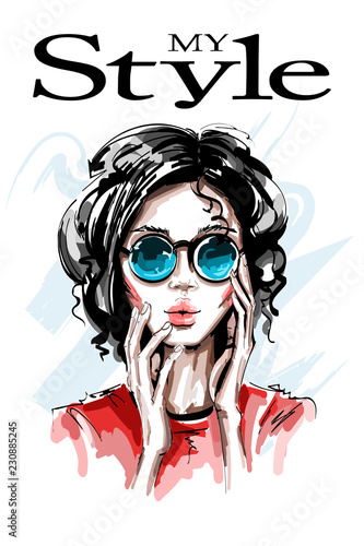 Hand drawn beautiful young woman in sunglasses. Stylish elegant girl. Fashion woman portrait. Sketch. © marisa__