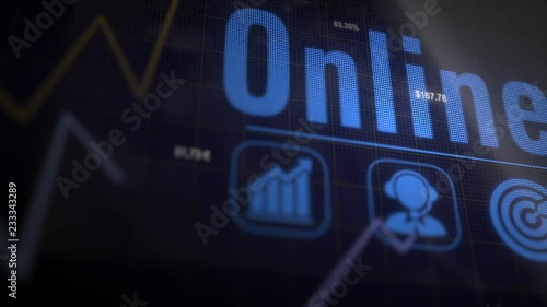 A Online business concept on a flashing computer monitor with moving graphs and data. © duncanandison