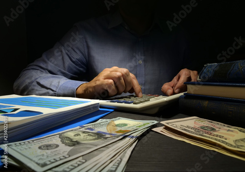 Accountant Uses Calculator For Money Counting Unsecured Personal Accountant Uses Calculator For Money Counting Unsecured Personal Loan