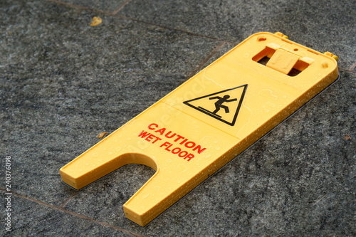 Caution Wet Floor Sign Laying On The Pavement Photos Ap Caution Wet Floor Sign Laying On The Pavement