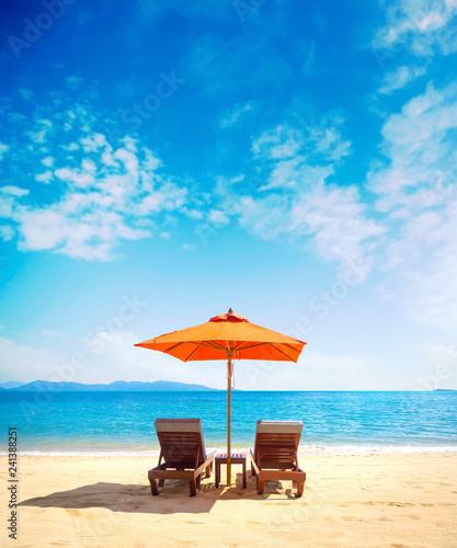 Two Lounge Chairs With Sun Umbrella On A Beach Photos Ap Two Lounge Chairs With Sun Umbrella On A Beach