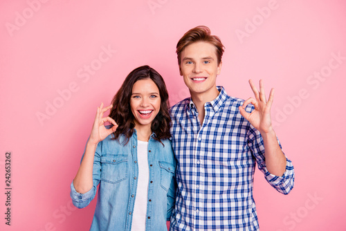 Close up portrait of two hugging young she her he him his glad s